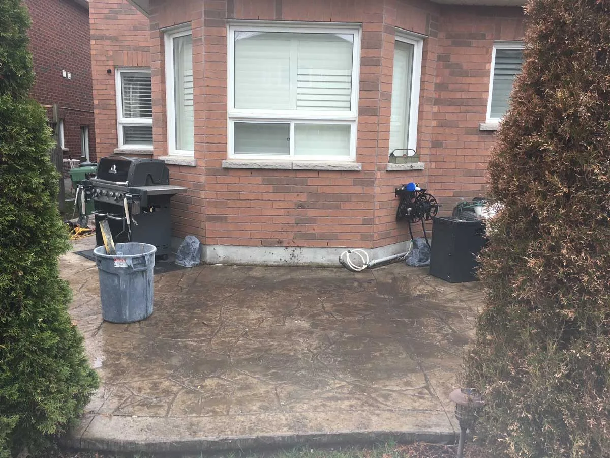 Same backyard patio with the hot tub removed