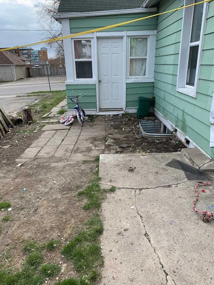 Same side yard cleared of debris